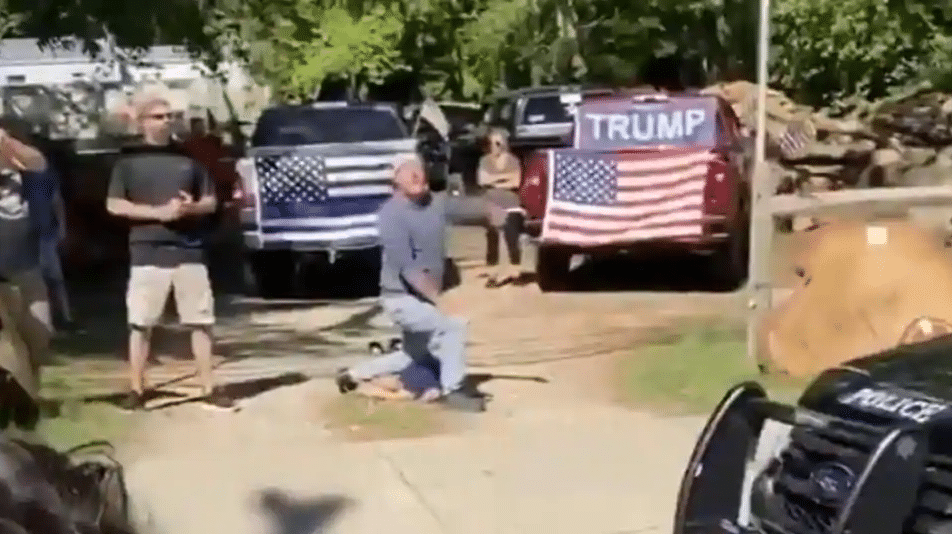 Video shows man with Trump banner